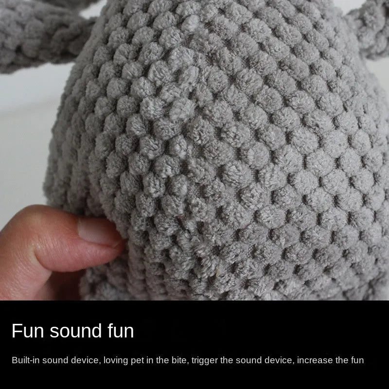 Soft plush dog chew toy in animal shape with internal squeaker for teeth cleaning and play.