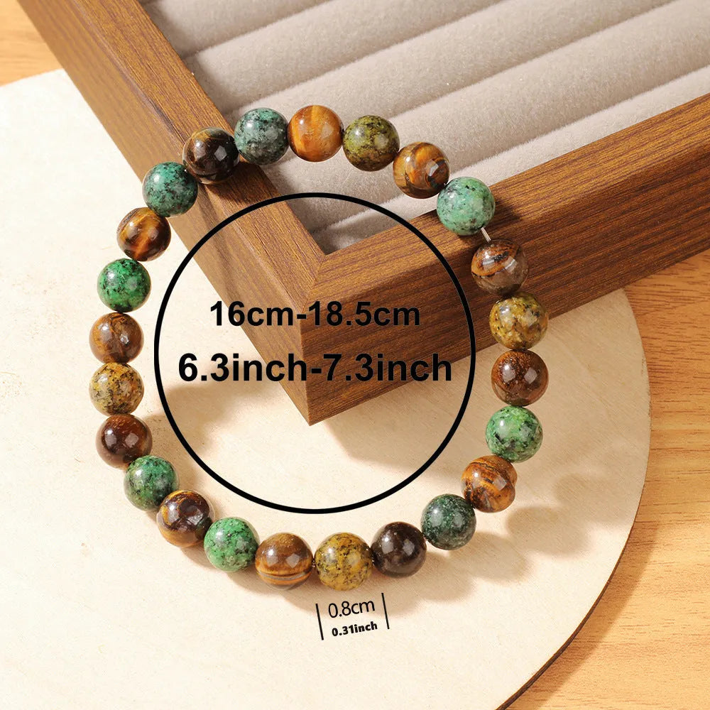 Tigereye stone bracelet with antique flower design measuring 18mm
