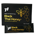 Glass jar of pure T1 Black Thai Honey with dark black coloured honey inside.
