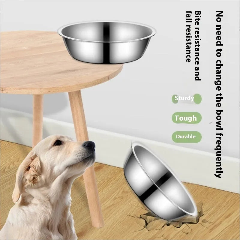 Stainless steel pet food bowl with non-slip base on a kitchen floor