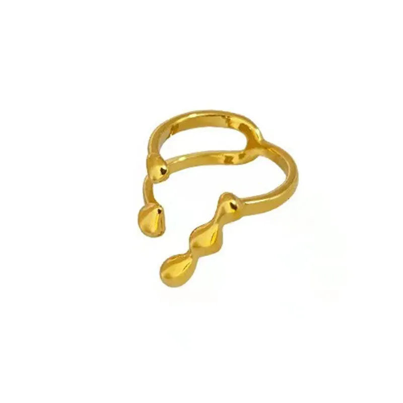 Brass opening ring for women with spherical design in gold or silver finish.