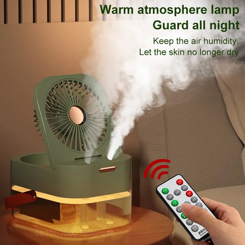 Pearl white USB desktop humidifier mist fan with water tank, remote control, and night light on a wooden desk.