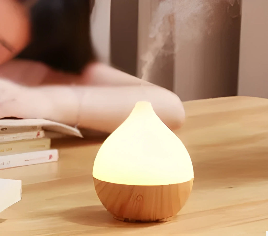 Asakusa wood grain finish vase-shaped 100ml USB aroma diffuser on a surface.