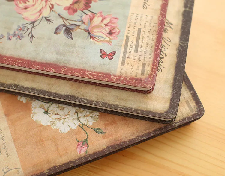 Hardcover notebook with retro floral cloth pattern in Lily, Peony, or White Rose designs, showing 25K and 50K sizes.