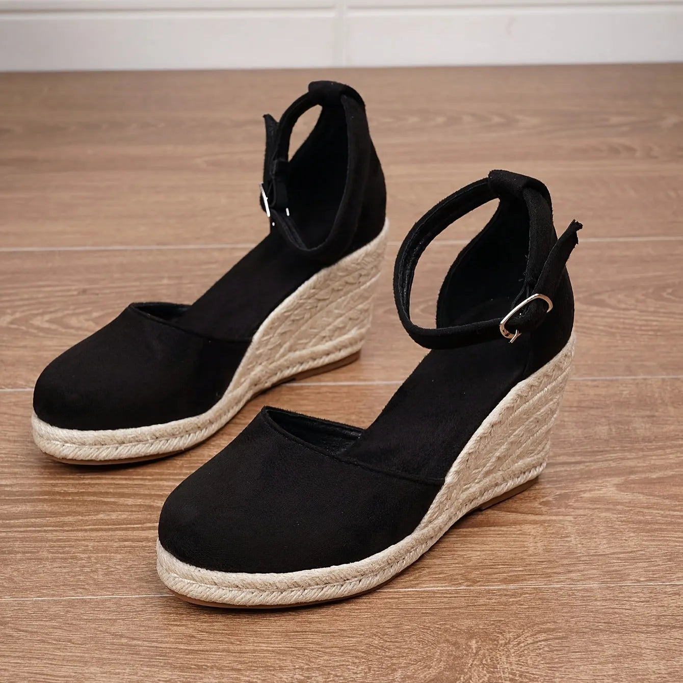Women's apricot and black wedge sandals with suede upper and Roman buckle fastening
