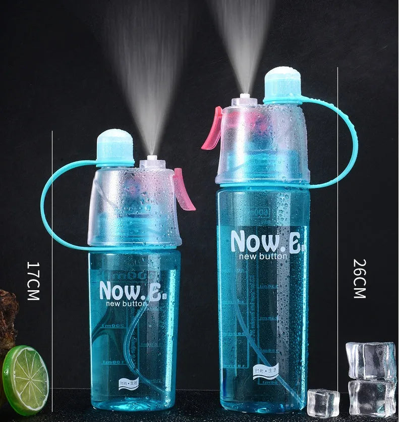 Green portable outdoor sports mist spray cup with handle, transparent scale, and spray mouth.