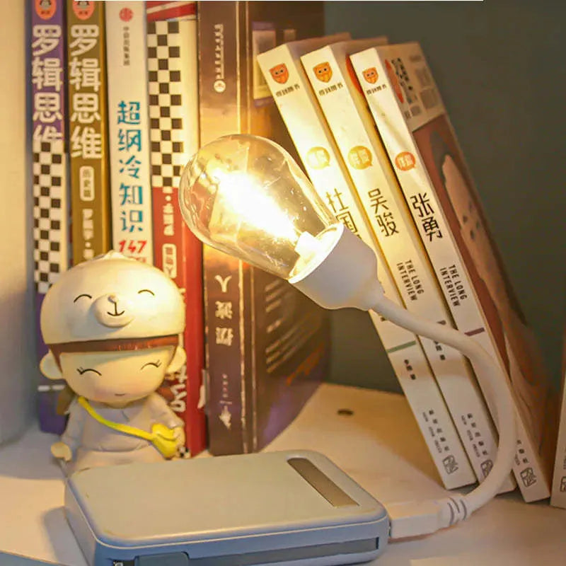 USB rechargeable folding tungsten night light with S14 bulb showing collapsed and extended positions