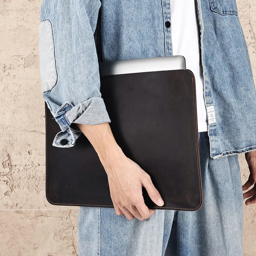 Brown genuine leather computer bag with horizontal laptop sleeve compartment