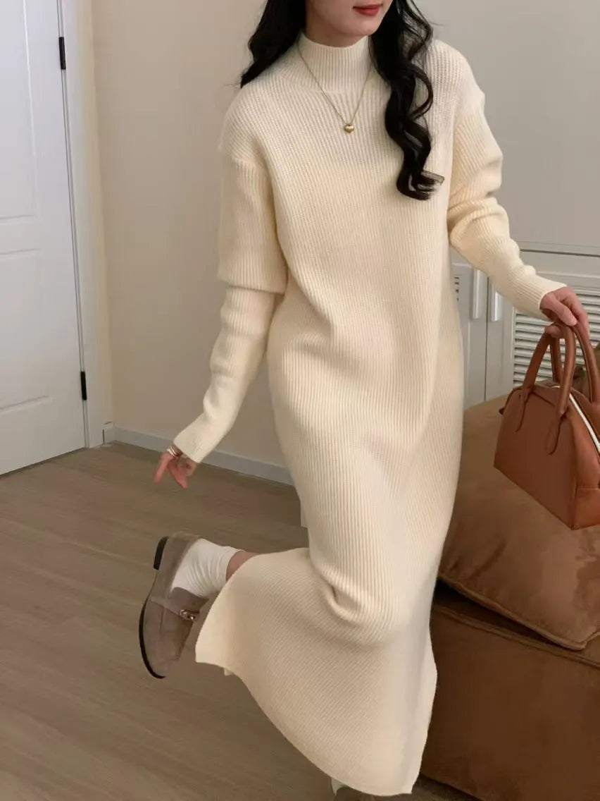 Women's acrylic knitted dress with half turtleneck, long sleeves, and midi length in solid colour