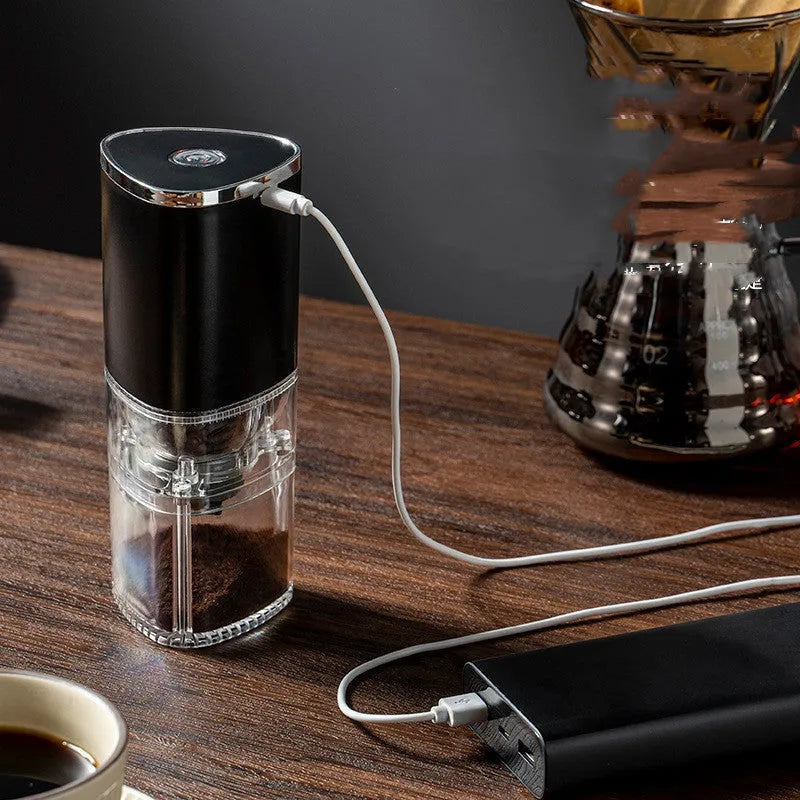 Frosted white portable electric coffee grinder with ceramic burr and USB-C charging port.