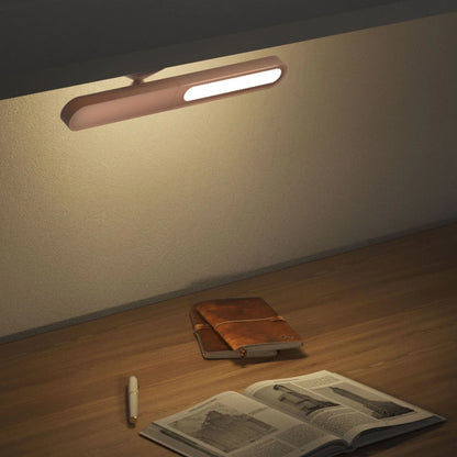 Versatile geometric desk lamp with wireless, magnetic, and multifunctional features for modern workspace lighting