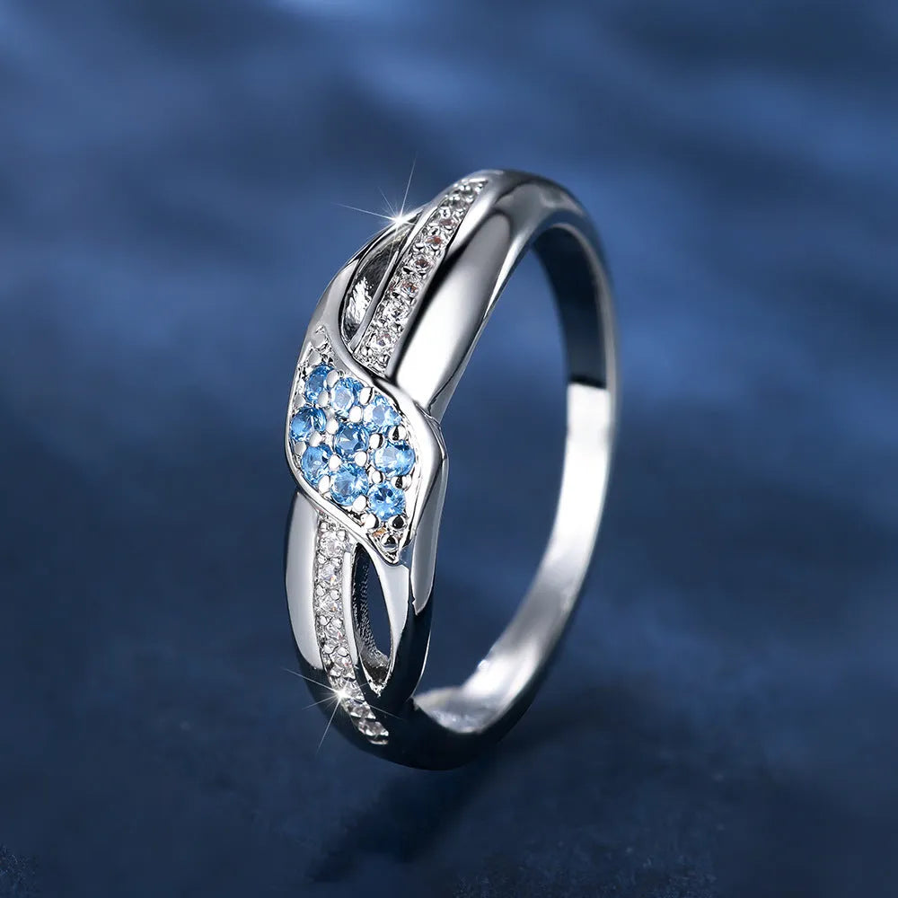 Copper geometric ring with sea blue diamond edge and white diamond leaf inlay, women's simple style