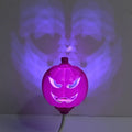 Plastic pumpkin decorative lamp with USB charging port and yellow or purple light options