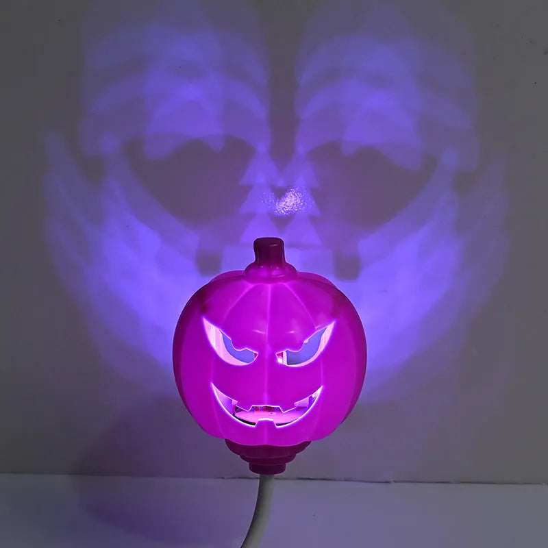 Plastic pumpkin decorative lamp with USB charging port and yellow or purple light options