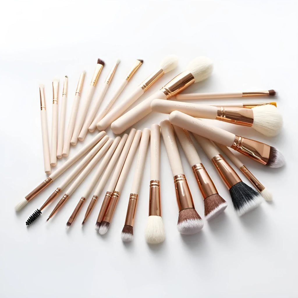 26 pink wooden handle makeup brushes with natural wool bristles in a PU storage bag.