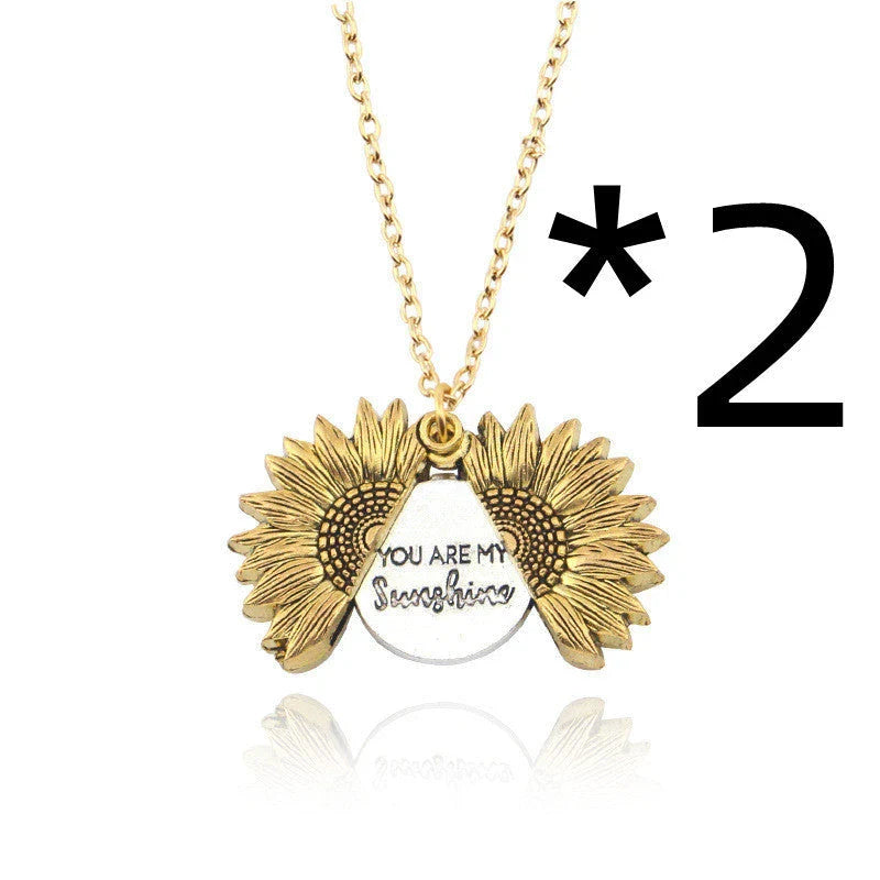 A stunning sunflower pendant necklace with an adjustable chain in various fashionable colors