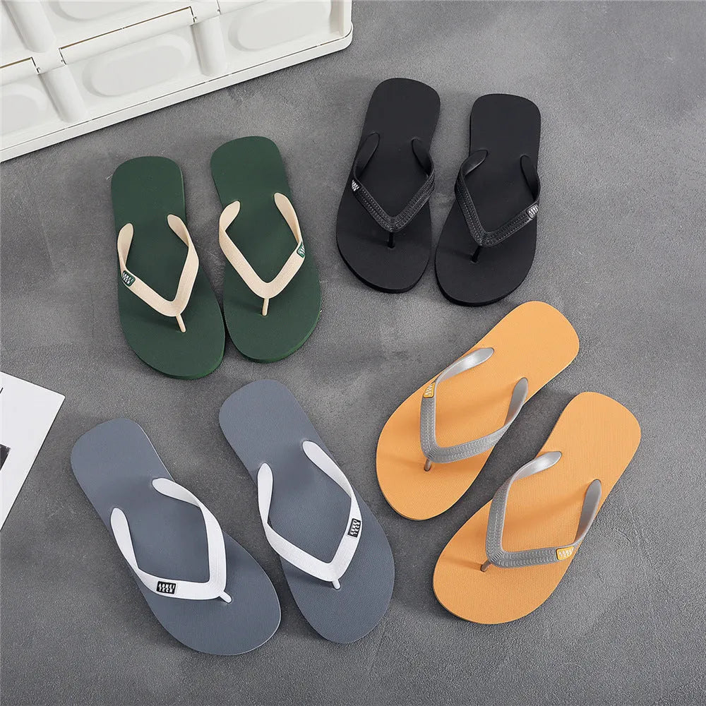 Men's black rubber flip-flop slipper with EVA upper and non-slip sole.