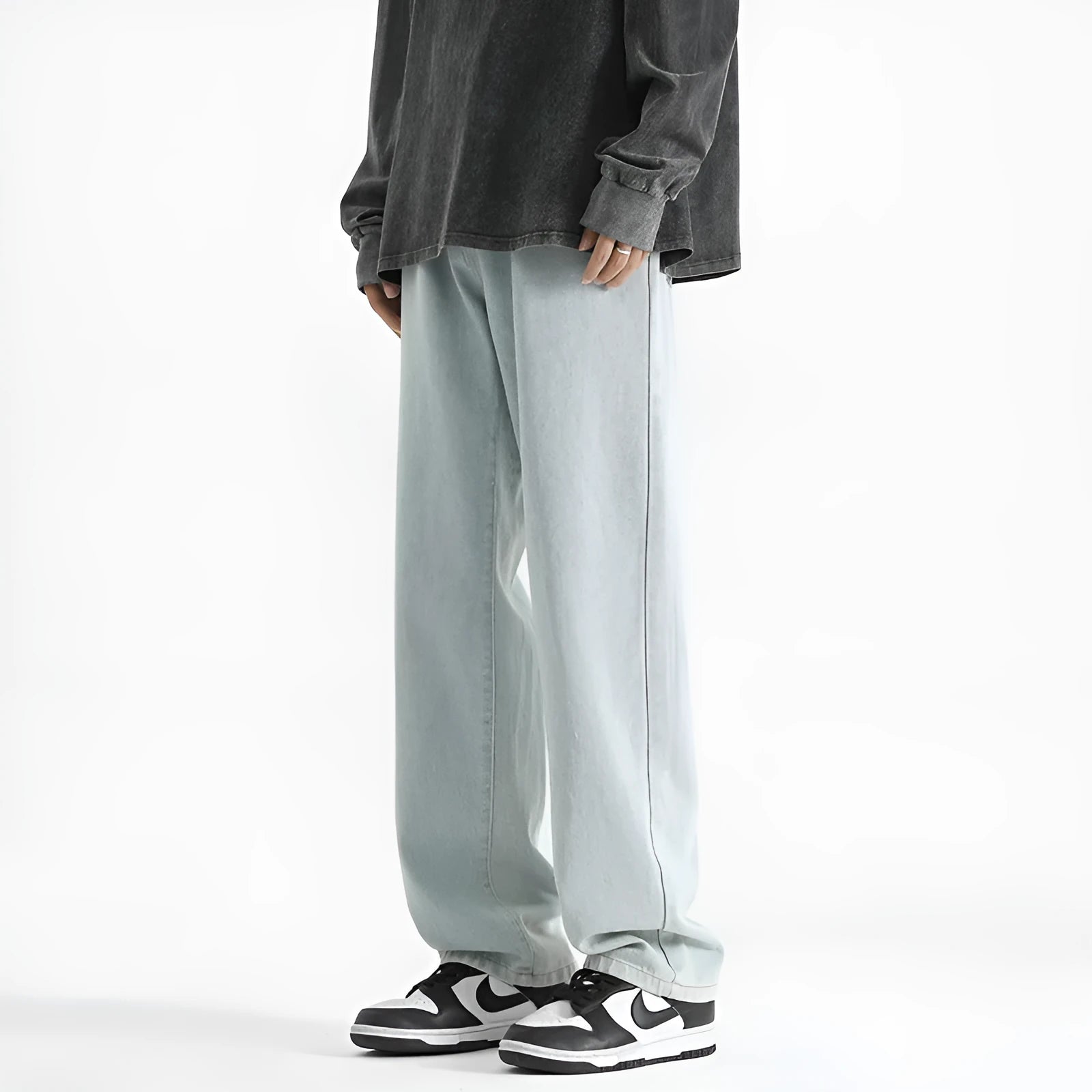Men's light blue straight leg jeans with button waist in washed denim fabric