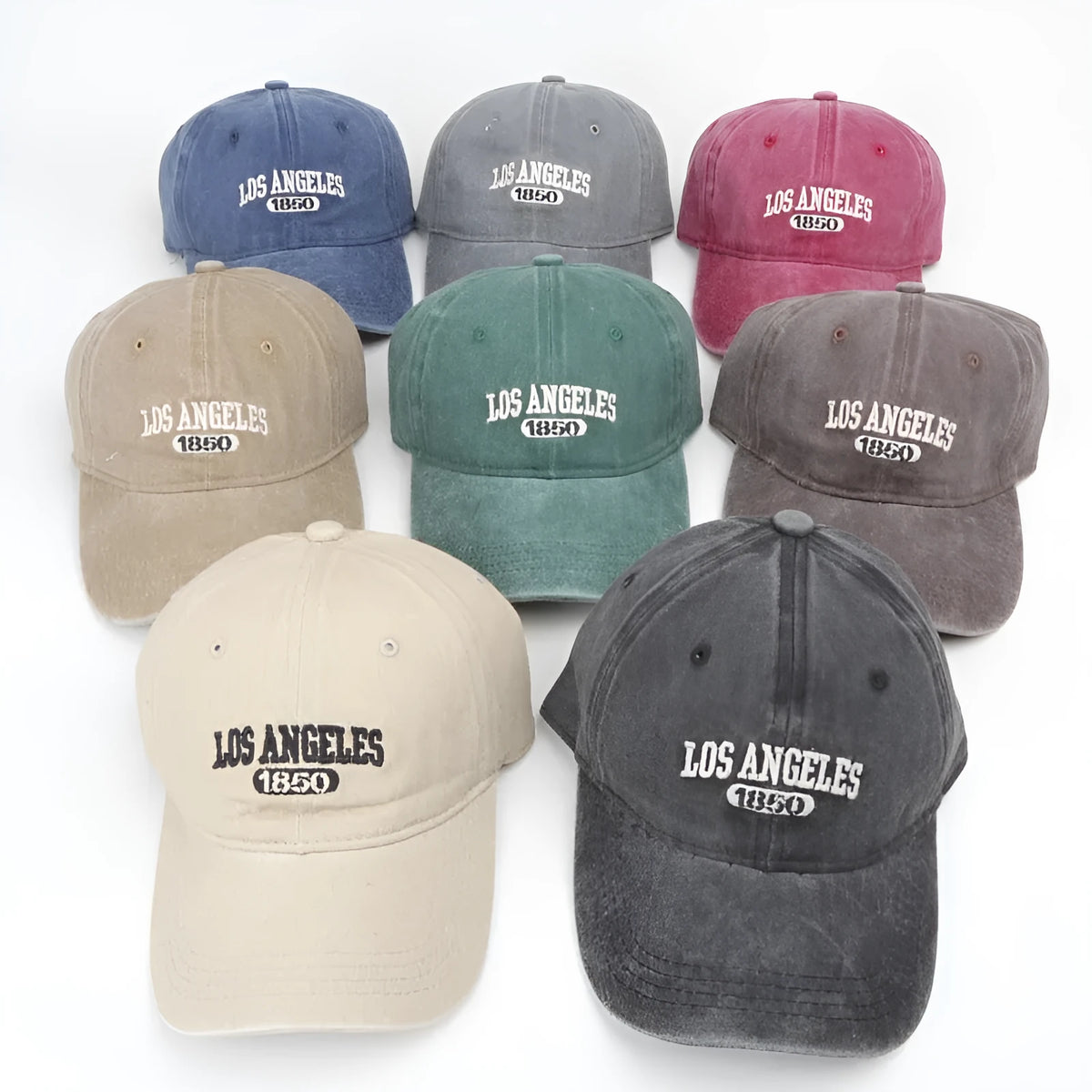 Retro distressed acrylic cap with embroidered letters, shown in beige colour with adjustable strap.