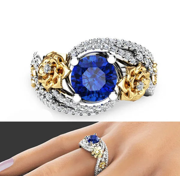 Flower rose two-tone copper ring for women with blue artificial gemstone on a white background