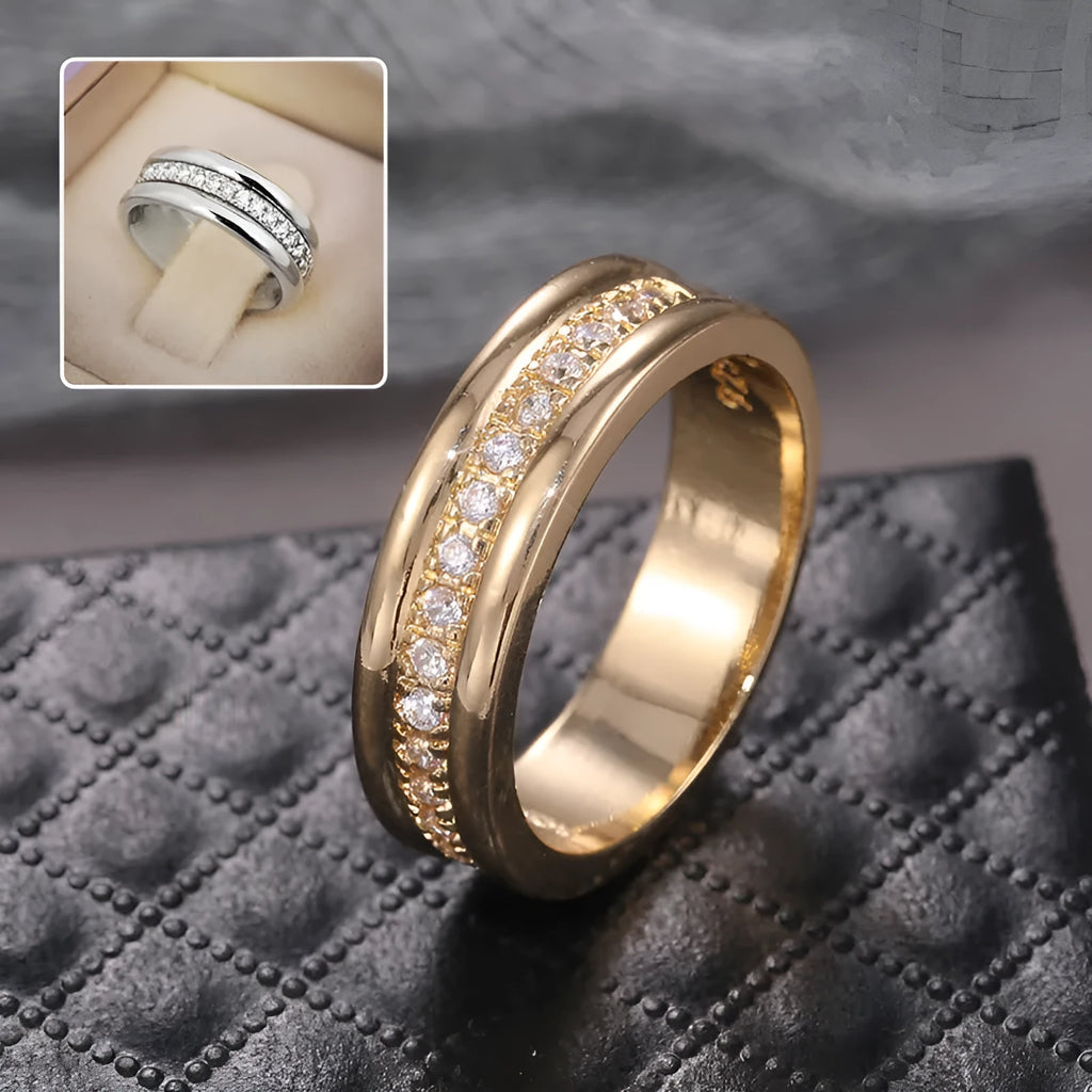 Gold-plated copper geometric ring with inlaid zircon on white background