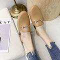 Women's PVC closed toe half slippers with buckle fastening in milky white