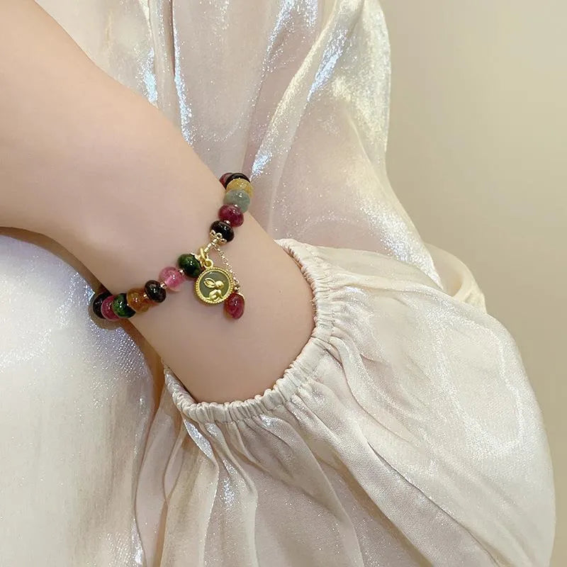 Handmade natural stone bracelet with colourful tourmaline rabbit pendant and geometric round beads