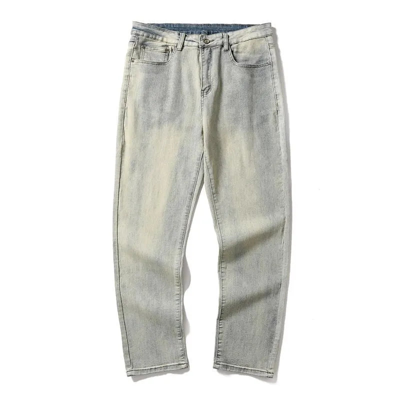 Men's washed distressed slim straight cotton tapered pants in Cement Yellow