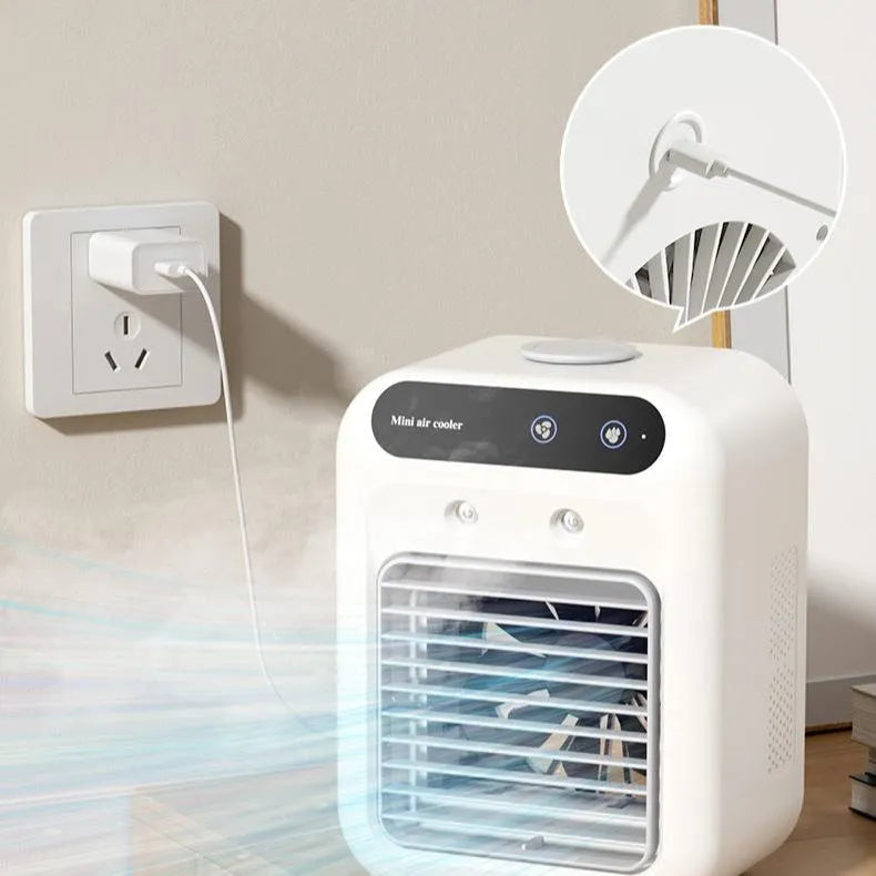 Compact ivory white portable USB air cooler with touchscreen display on a desk.