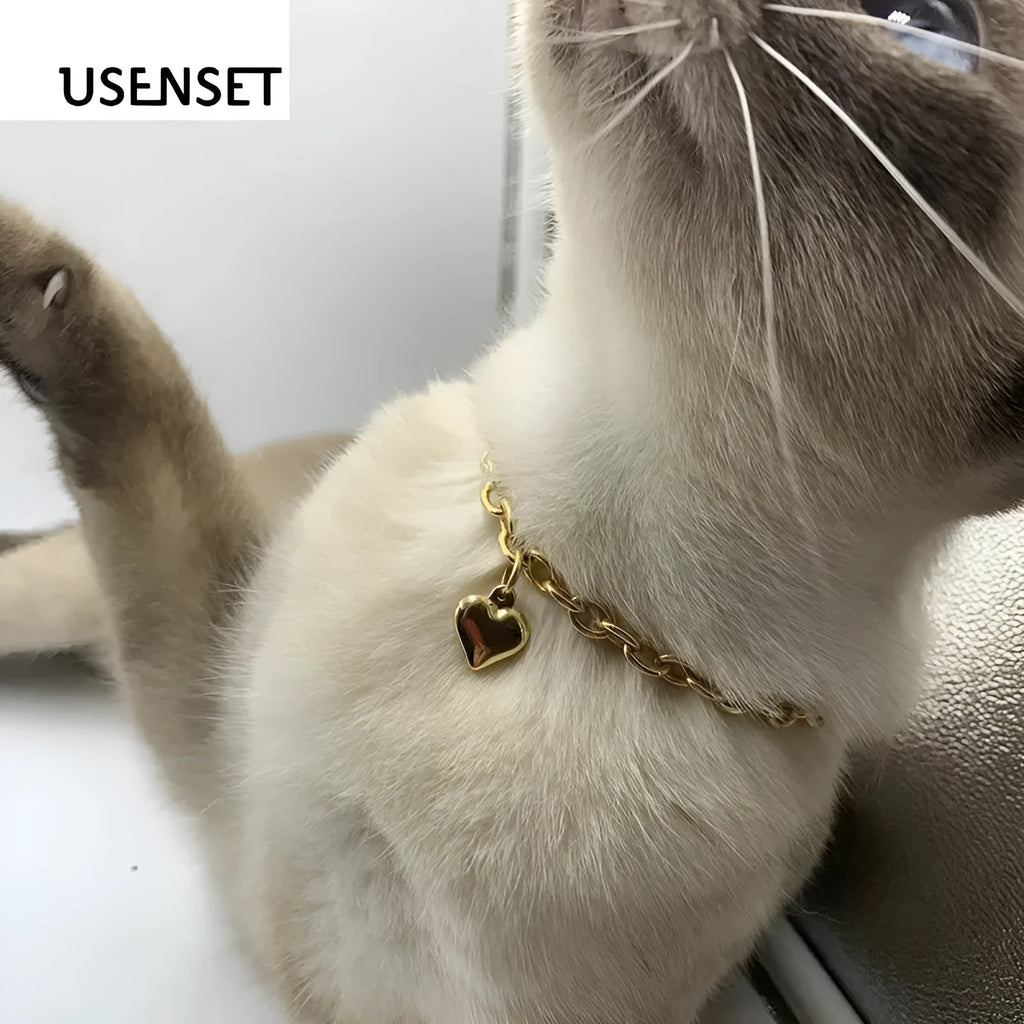 Stainless steel necklace with a heart-shaped pendant featuring a detailed animal model on a curb chain.