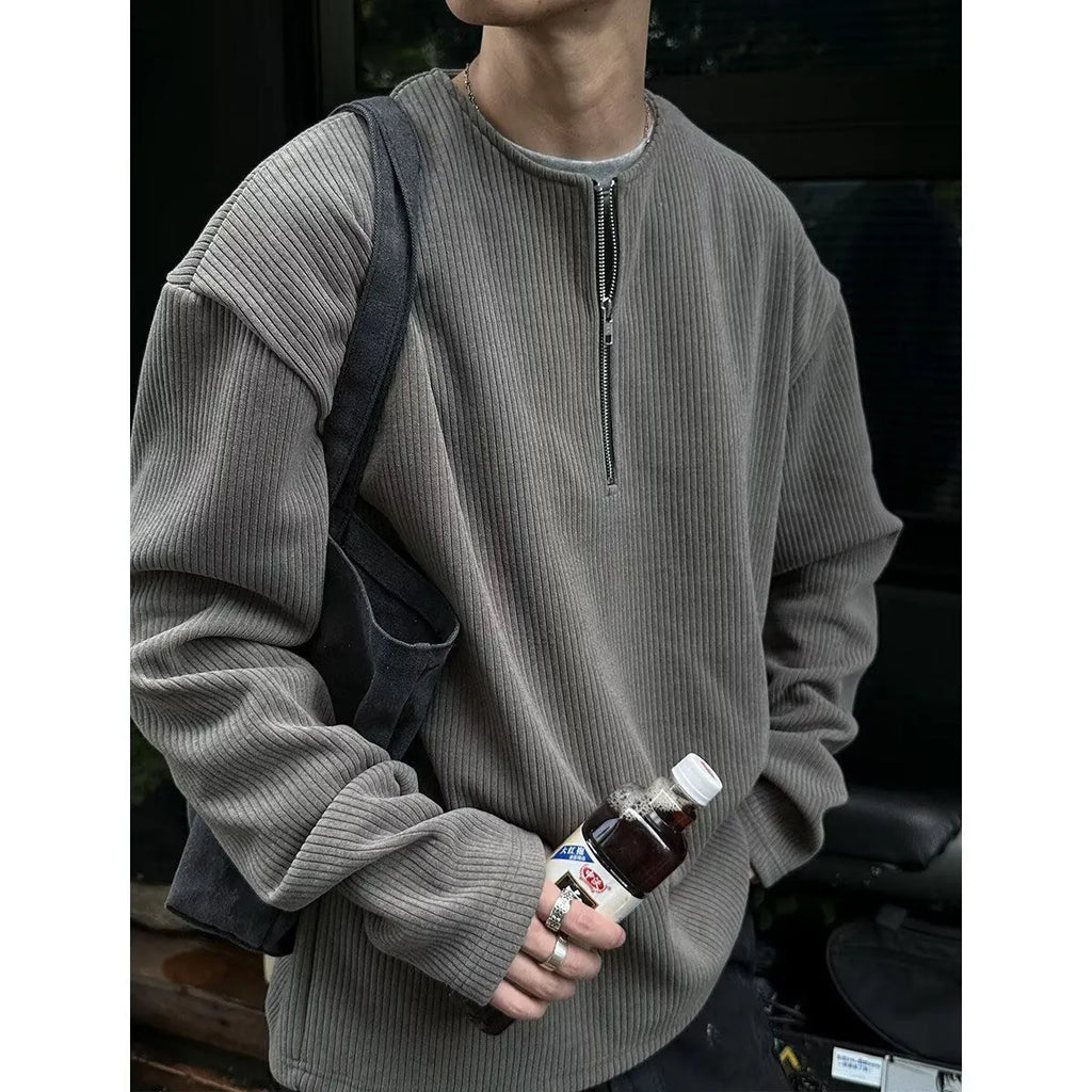 Solid colour loose pullover shirt with long sleeves for early spring layering