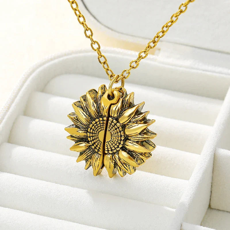 A stunning sunflower pendant necklace with an adjustable chain in various fashionable colors