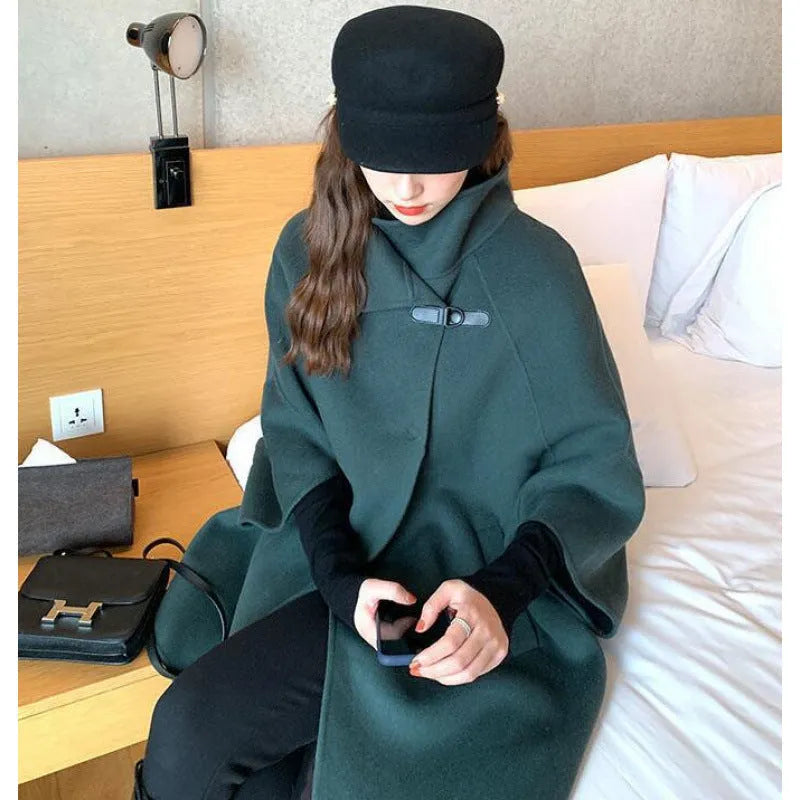 Women's Korean style long coat in oatmeal colour with flight sleeves and acrylic fabric