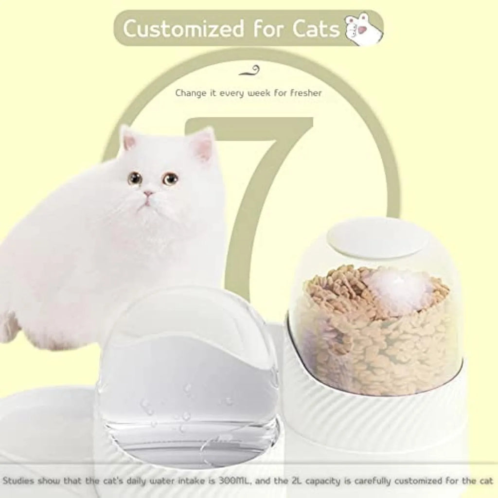 White gravity cat feeder and water dispenser set with wave design on a table.