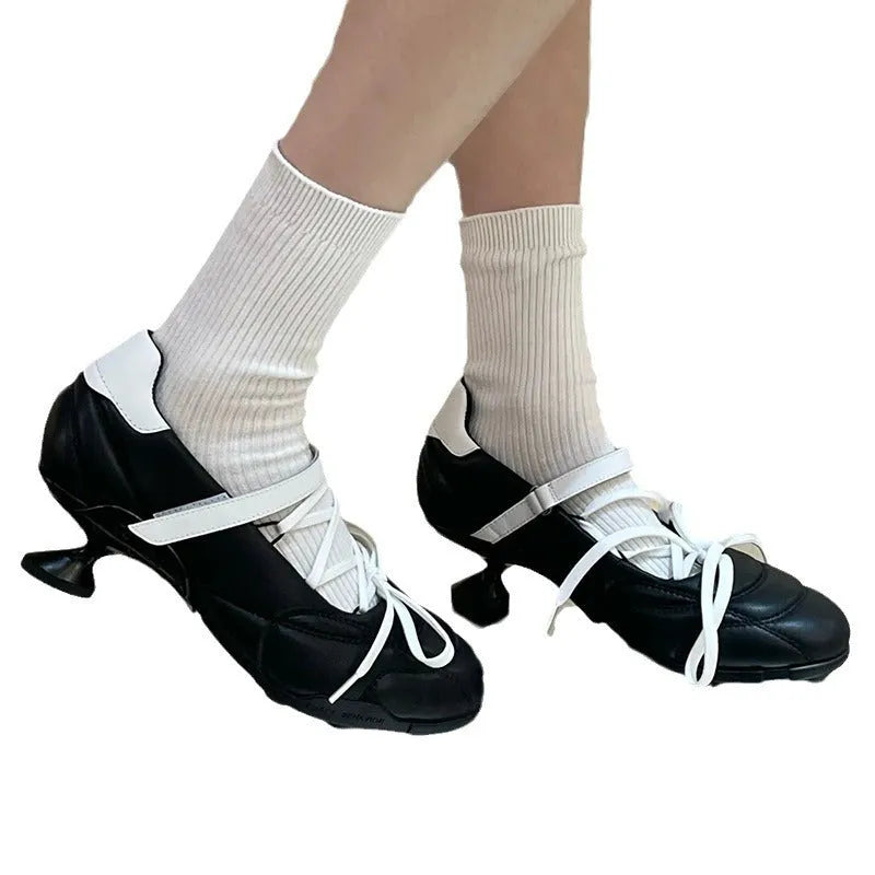 Women's silver lace-up sports shoes with bow detail and 3-5 cm mid-heel on microfiber upper
