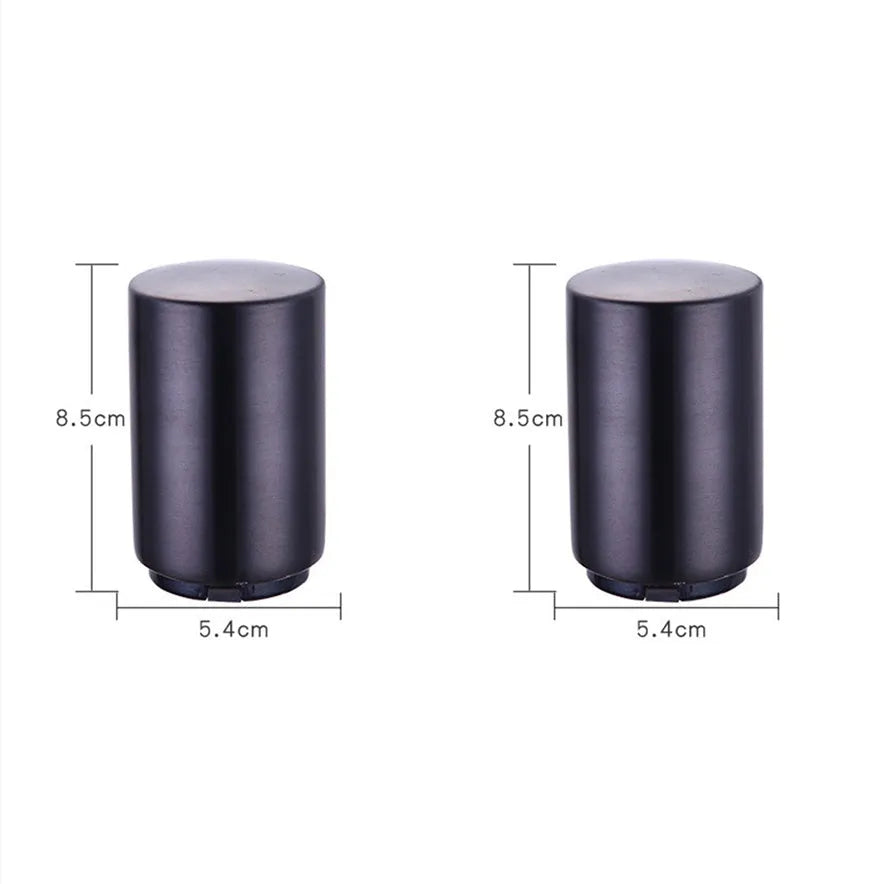 Portable magnetic stainless steel bottle opener with brushed metal finish on countertop