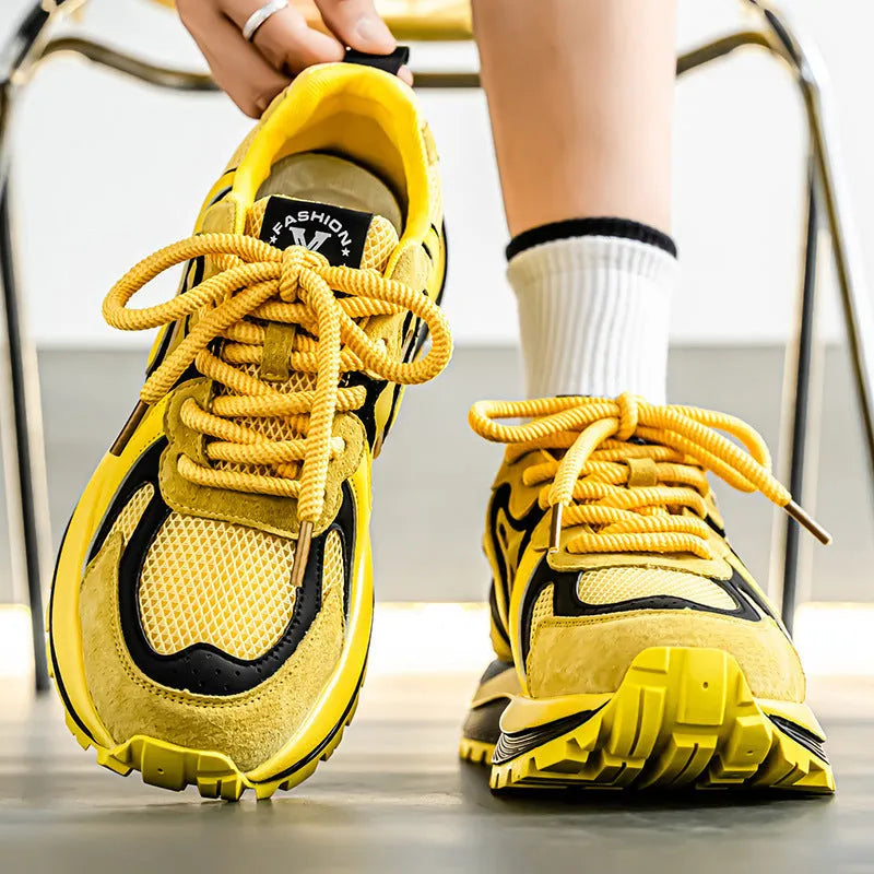 Men's casual sneakers in black, white, or yellow with round toe and lace-up design