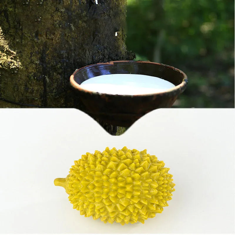 Durian-shaped dog chew toy in bright colours with teeth-cleaning ridges and squeaker ball