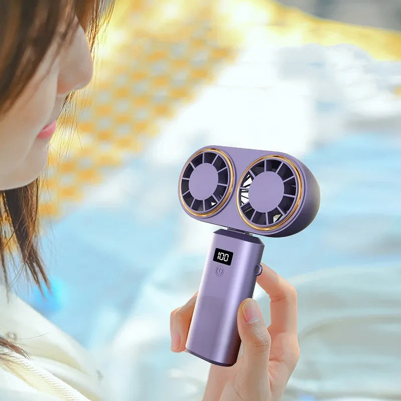 USB rechargeable handheld mini fan with digital display showing battery level