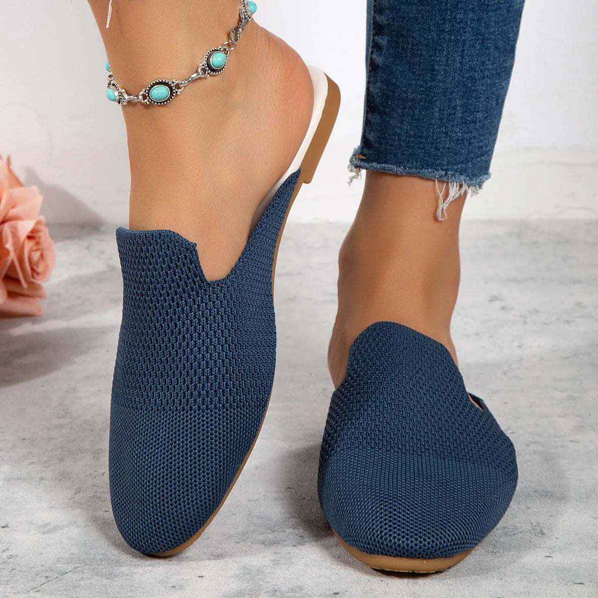 Apricot, blue, and green mesh slip-on flat sandals with round toe and cloth upper.