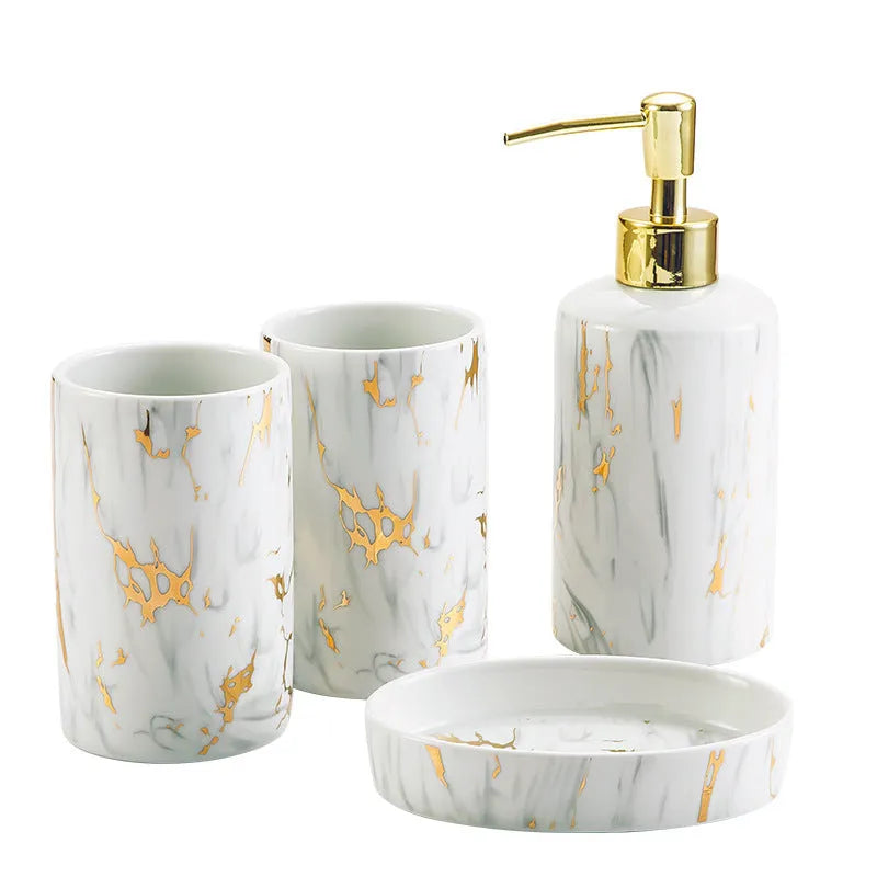 White ceramic bathroom wash kit with two cups, latex bottle and soap box in packaging