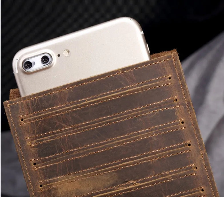 Men's black cowhide leather card holder wallet open to show 18 card slots, money pocket, and phone pocket.