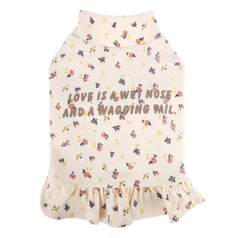 Light purple floral undershirt for a small Bichon Frise dog worn as a skirt.
