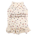 Light purple floral undershirt for a small Bichon Frise dog worn as a skirt.