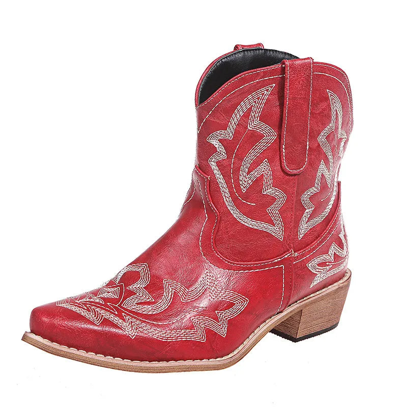 Blue embroidered women's cowgirl boots with a low wedge heel and pointed toe.