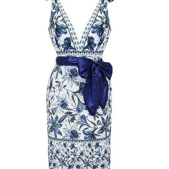 Women's printed one-piece swimsuit with sleeveless design, polyester fabric and optional matching skirt in sizes S to XL.