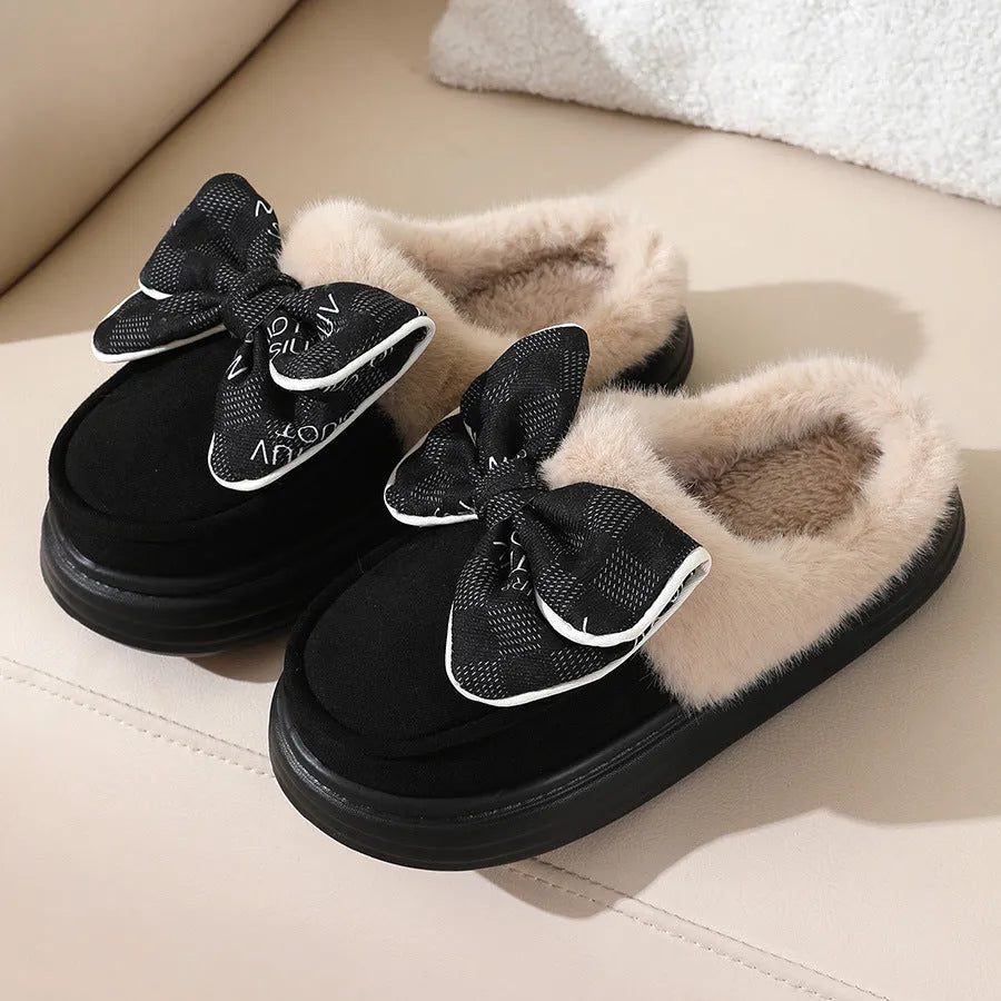 Bowknot plush slippers for women with suede upper, rubber sole, and short plush lining in bow brown, black, or khaki.
