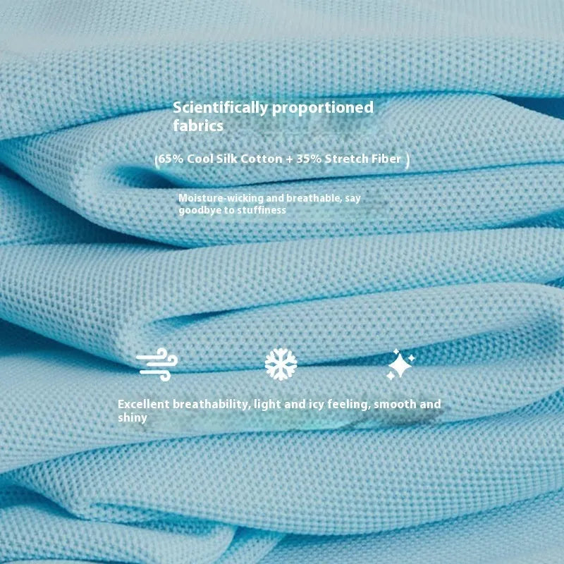 A sky blue short sleeve casual work shirt made from cool silk cotton and elastic fibre blend on a hanger.