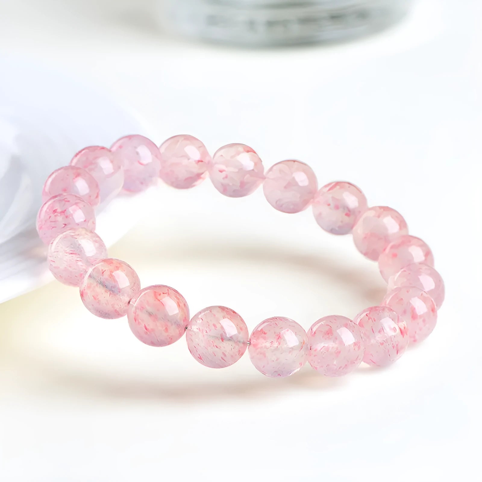Natural white water strawberry quartz crystal bracelet with 10–10.8mm round beads.