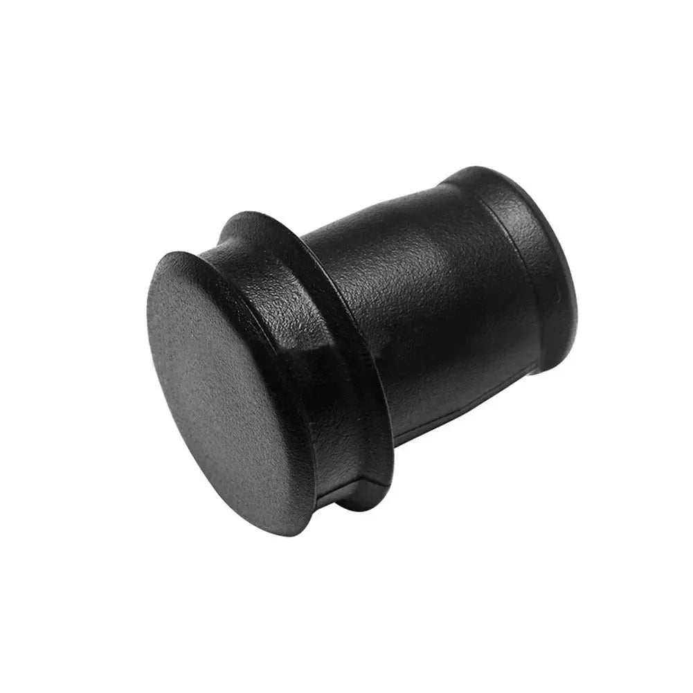 Black PVC car cigarette lighter dust plug for 12V socket protection.